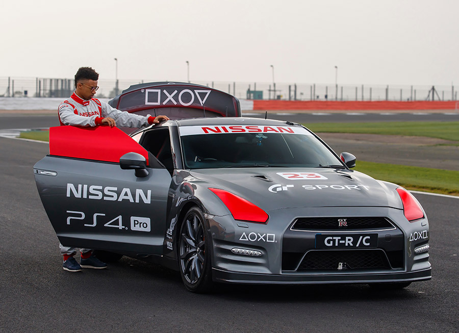Jann Mardenborough laps Silverstone in a Nissan GT-R with a PS4 controller